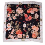 Salvatore Ferragamo, a silk? cream & black scarf by Salvatore Ferragamo with a coral pink rose &