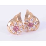 A pair of 9ct yellow gold leaf & flower design earrings set approx. 0.12 carats of ruby (total