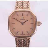 Omega, a ladies vintage 9ct yellow gold Quartz wristwatch with hexagonal shaped face, herringbone