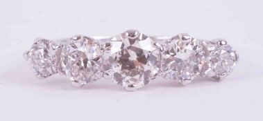 An impressive platinum five stone ring set with approx. total weight 2.15 carats of old round cut
