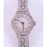 An antique 18ct white gold ladies cocktail watch ornately set with diamonds with an 18ct white