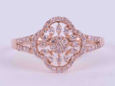A 9ct rose gold flower open filigree design ring set 0.36 carats of pink round brilliant cut