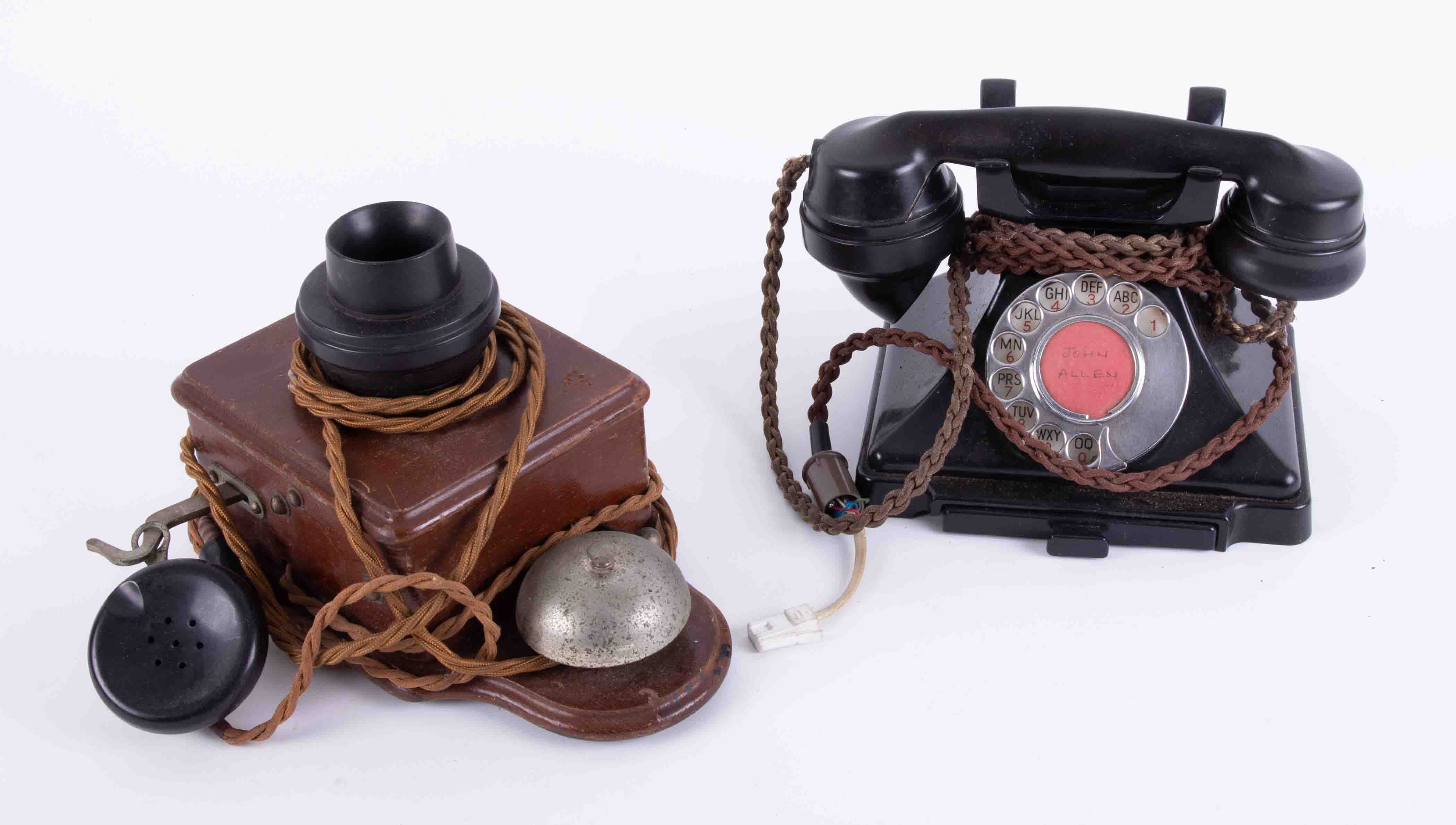 A vintage black GPO telephone together with an antique wall mounted bell phone (2).