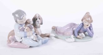 Lladro, two figure groups including child with dog and puppies "My Friends", No 5.456, boxed, height