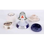 A collection of seven pub ashtrays including Watson Blue Band, Doulton Bass in a bottle, Shelly