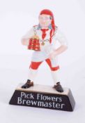 A Carlton Ware brewery china figure, "Pick Flowers Brewmaster", height 25cm.