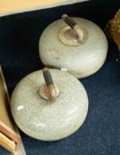 Two heavy curling stones.