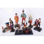 A collection of various pub advertising figures, plastic and composition to include Coronetti figure