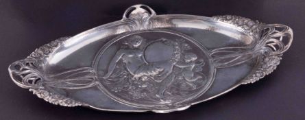 WMF, an Art Nouveau style tray with embossed figure decoration, length 33cm.