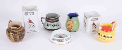 Six various pub jugs including advertising Johnny Walker, Mamcnish, etc (7).