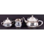 WMF, a silver plated and gilt lined three piece tea service.