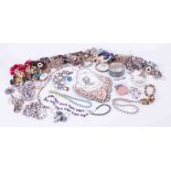 A bag of various costume jewellery.