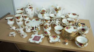 Royal Albert Old Country Roses, a collection including coffee pot, teapot, cups, saucers, cream/milk