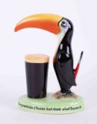 A Carlton Ware Guinness Toucan, H24cm (restored re stuck at base and also at tail).