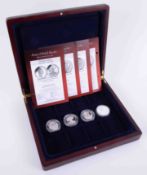 Four silver proof crowns, Roses of British Royalty with mahogany case.