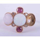 An 18ct yellow gold white opal, old cut diamond & ruby set ring (one opal missing), 4.58g, size O.