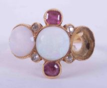 An 18ct yellow gold white opal, old cut diamond & ruby set ring (one opal missing), 4.58g, size O.