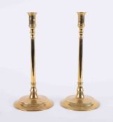 A pair of Georgian brass candlesticks with round baluster base and stem, height 12 .50".