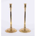 A pair of Georgian brass candlesticks with round baluster base and stem, height 12 .50".