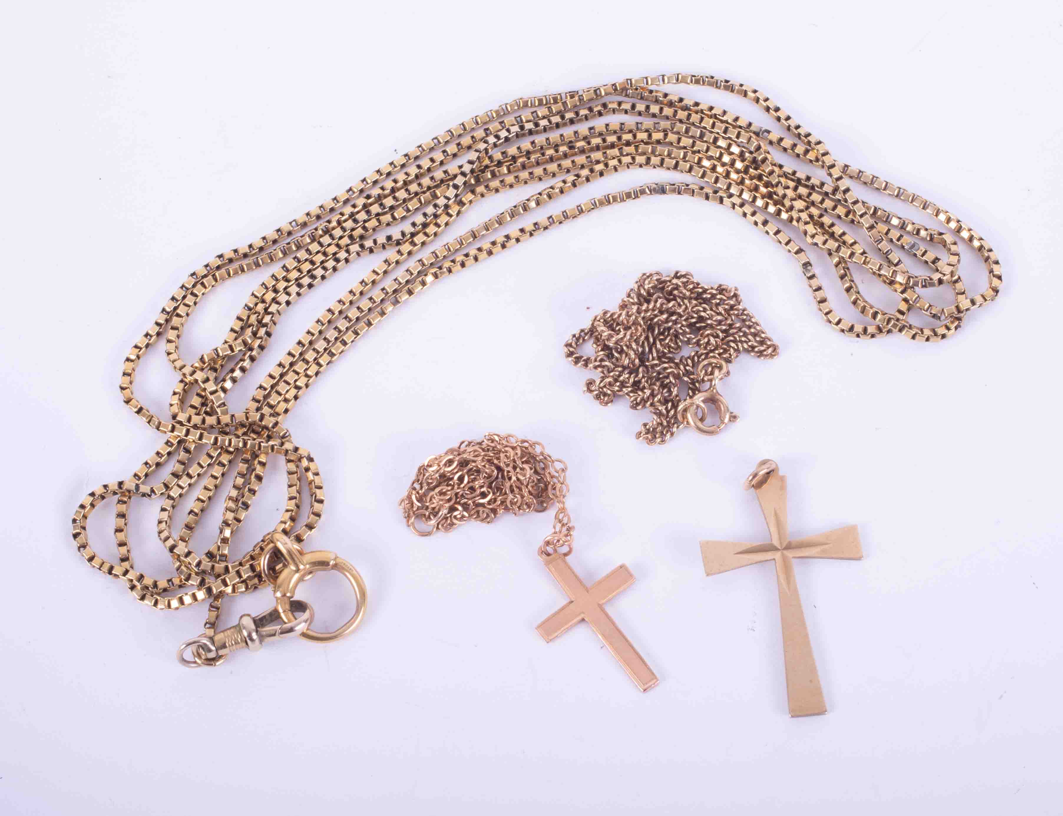 A mixed bag of 9ct gold jewellery comprising three chains, two crosses, approx. 31gm.
