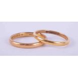 Two 22ct gold wedding bands, both size N, total weight 5.48gm.