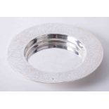 Silver plated communion patten with ecclesiastical engraved raised border dimensions 7.5 dia x 3cm.