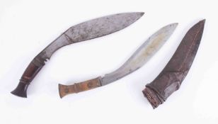 A Kukri knife and another with leather scabbard (2).