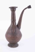 An antique Mughal tinned copper ewer, height 15".