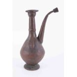 An antique Mughal tinned copper ewer, height 15".