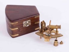 A reproduction miniature sextant in hardwood and brass bound military type box, length 13cm x 14cm.