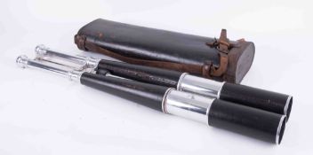 A pair of long binoculars and leather case, extendable, stamped Saint Etienne Cycles, extended