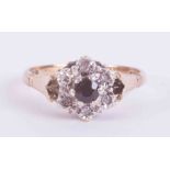 A white & yellow gold sapphire & diamond cluster ring with detailed Insurance replacement valuation,