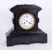 A Victorian black marble and malachite inlaid mantle clock with bell strike, pendulum and key,