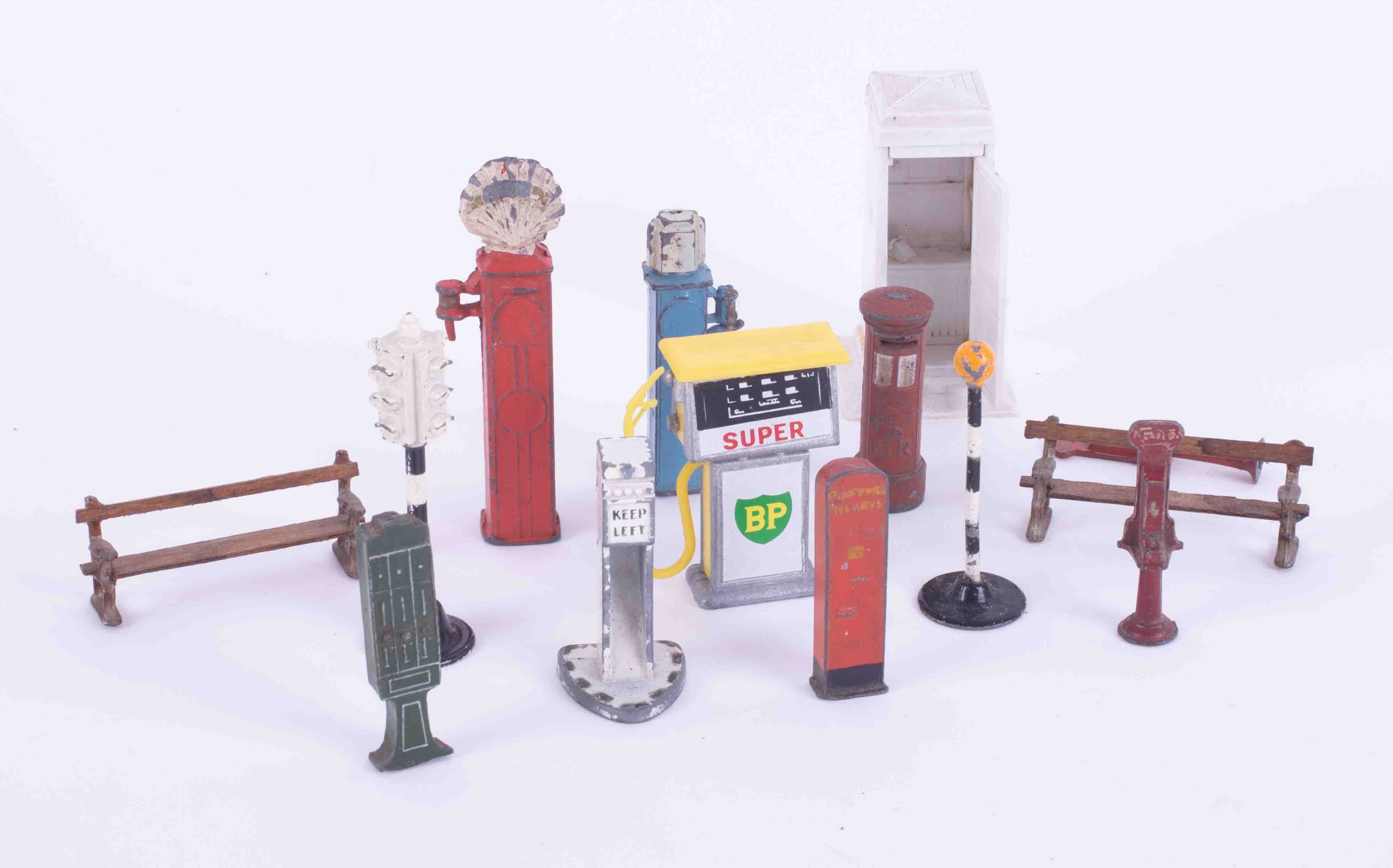 A mixed collection of lead Traffic light system, Benches, Postbox, Petrol Pumps etc.