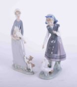 Lladro, girl with geese, No 5.202, boxed, together with another similar (2), the tallest 30cm.