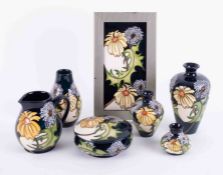 Moorcroft pottery by designer Kerry Goodwin to include rectangular plaque, trinket box, jug,