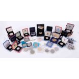 A mixed collection of commemorative coins including Royalty mainly nickel but also silver proof