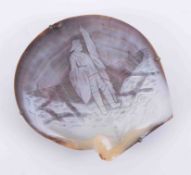 The antique carved oyster shell depicting a Cornish fisherman, from the Cornish coat of arms,