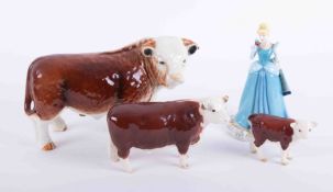 Beswick, two bulls and a large Nelson pottery bull together with a Royal Doulton Disney Princess,