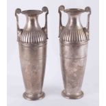 WMF, a pair of tall white metal Greek style trophy vases, height 39cm.