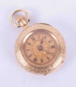 Antique 18k gold fob watch, the backplate marked D.F & C, keyless movement, gilt dial with black