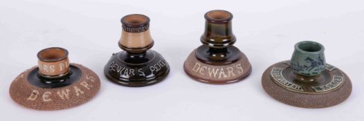 Three Doulton match strikers (one damaged) advertising Dewar's and one other "Lovatt Ware Ross,