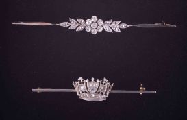 Two brooches to include a yellow & white gold (no hallmarks & not tested) bar brooch with a flower &