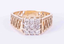 An ornate design 18ct yellow gold ring set with approx. 0.54 carats of round brilliant cut