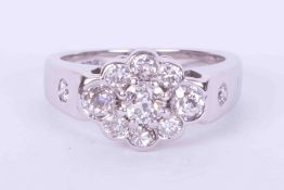 An 18ct white gold cluster style ring set with approx. total weight 1.55 carats of round brilliant