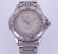 Tag Heuer, wristwatch, boxed with outer box, the dial marked Professional 200 meters with booklet,