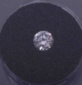 A 0.07 carat round brilliant cut diamond in presentation case and box with certificate colour H,