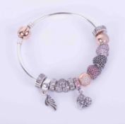 Silver Pandora bangle with a rose gold plated clasp and twelve various crystal encrusted beads and