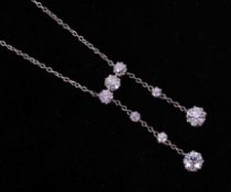 An antique platinum & rose gold diamond drop necklace (not hallmarked or tested), set with eight
