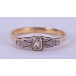 An 18ct yellow & white gold traditional style ring set with small old round cut diamonds, 2.17gm,